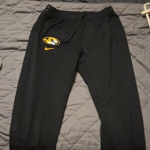 Nike Black Joggers with Gold and Yellow Logo